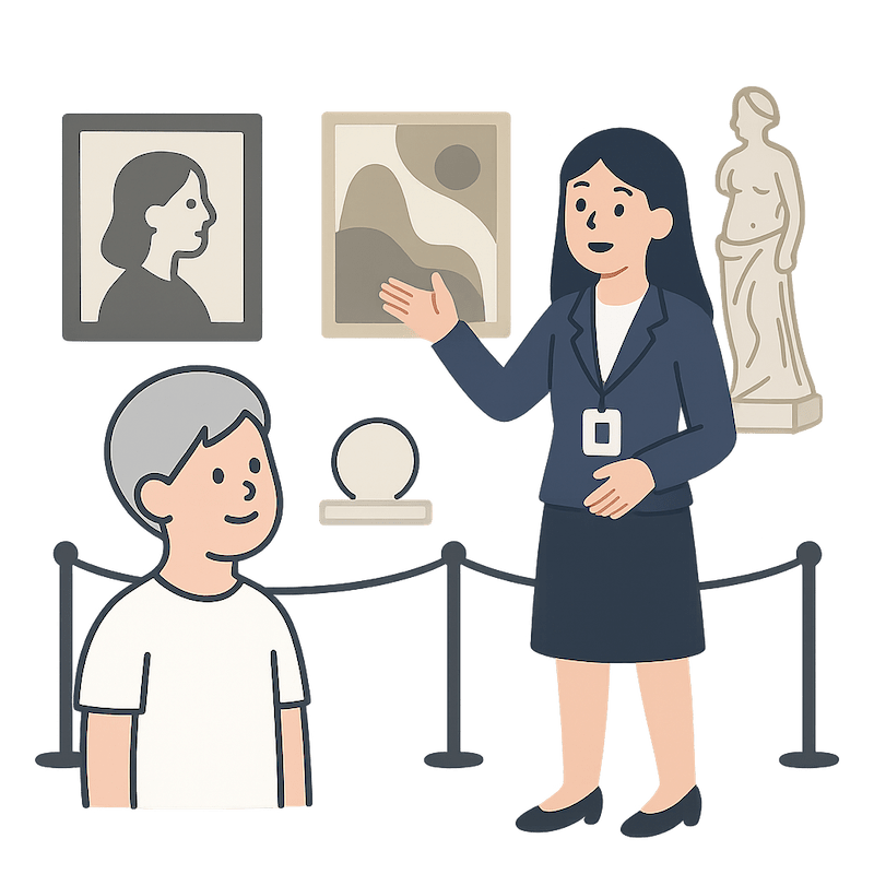 来館者へ展示作品を解説する学芸員